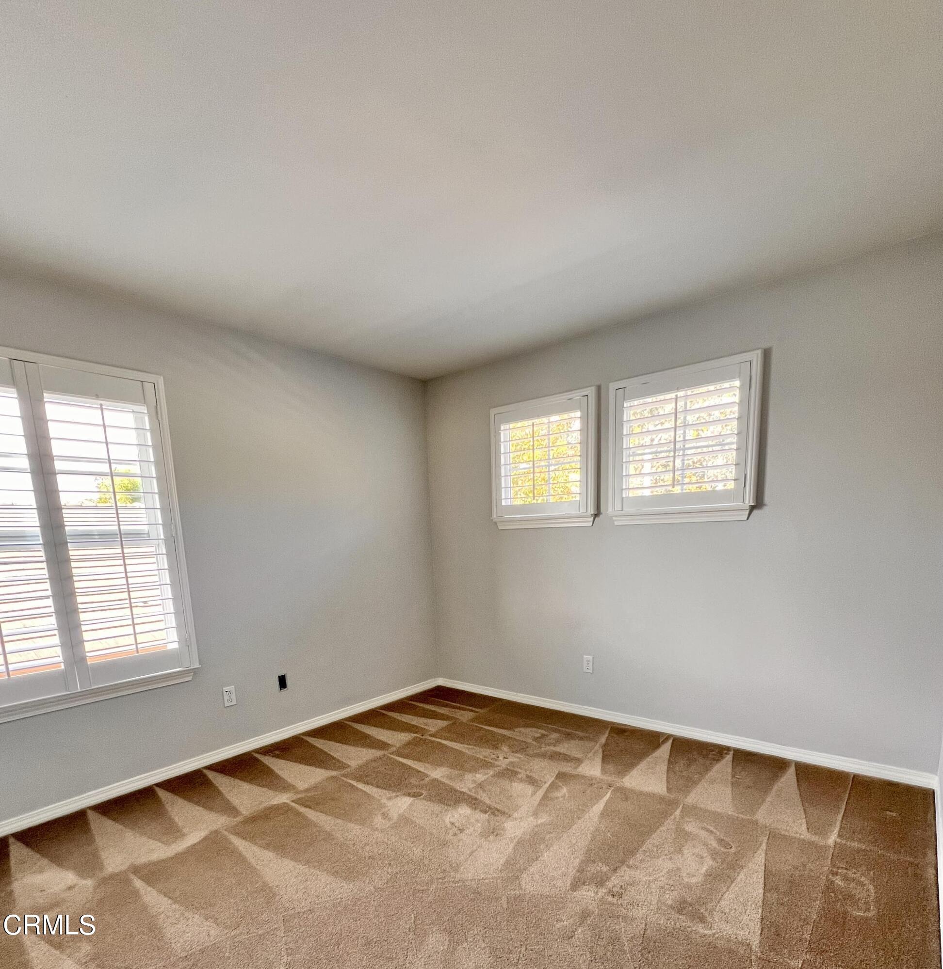 652 Corte Elegante Camarillo, CA 93010 - Photo 9 of 18 a view of an empty room with a window