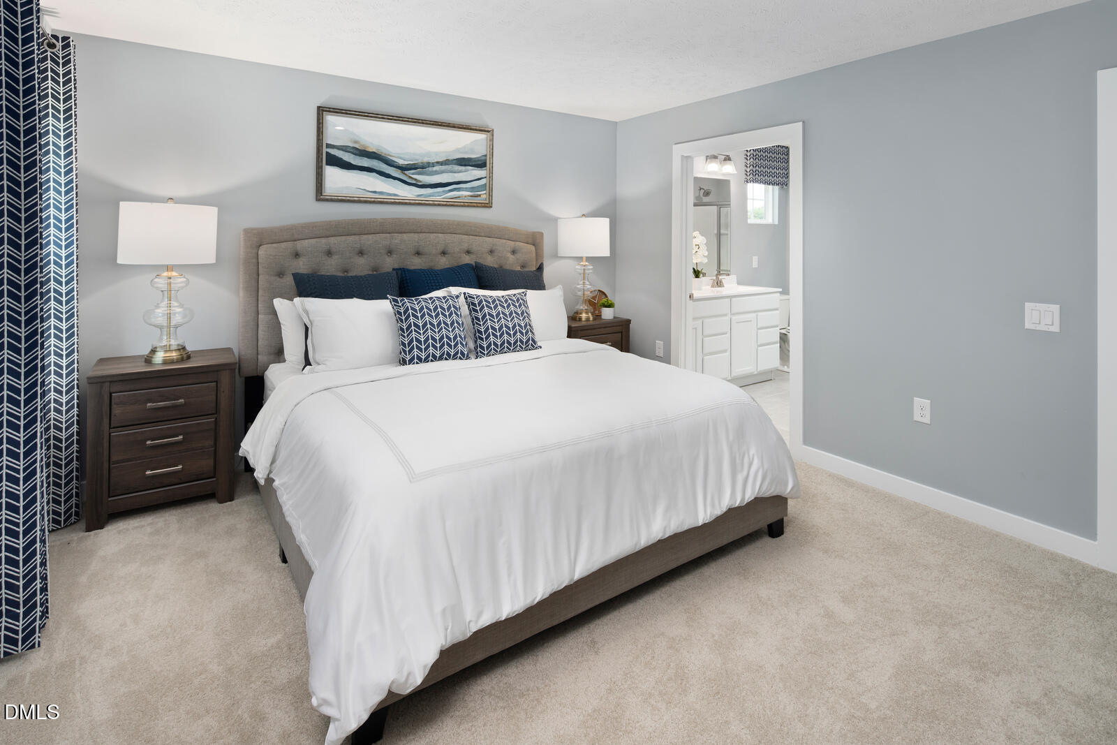 505 Matthiola Drive Wendell, NC 27591 - Photo 17 of 35 a bedroom with a bed and a cabinets