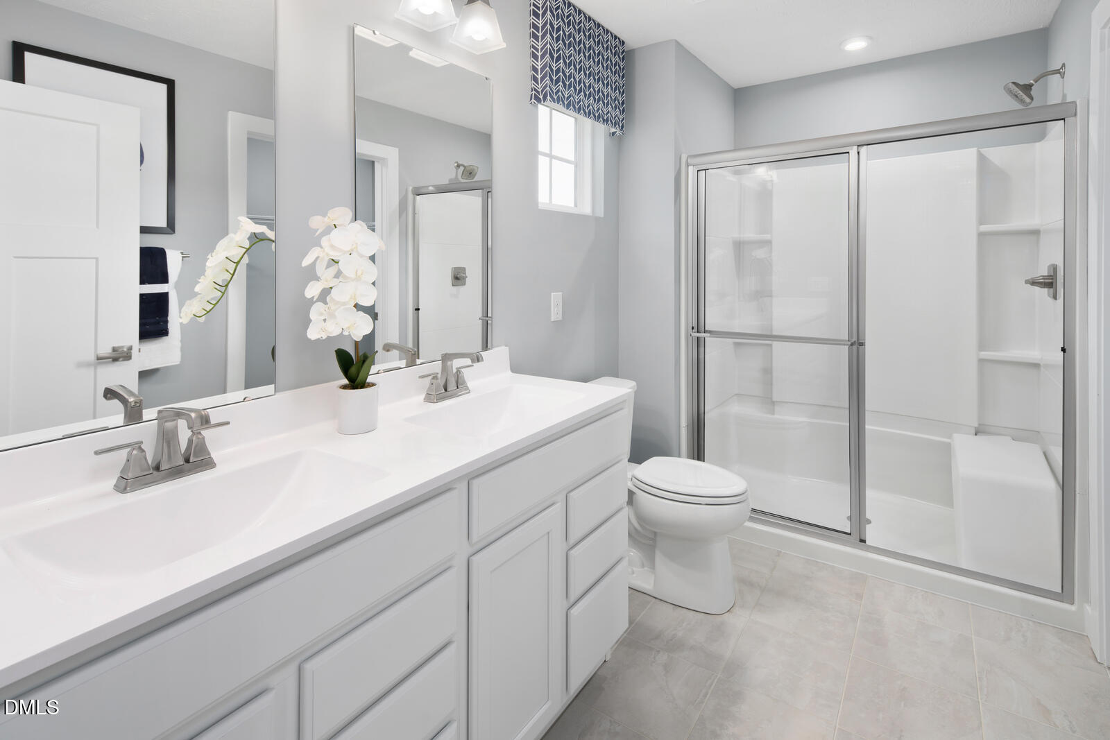 505 Matthiola Drive Wendell, NC 27591 - Photo 20 of 35 a bathroom with a toilet sink and shower