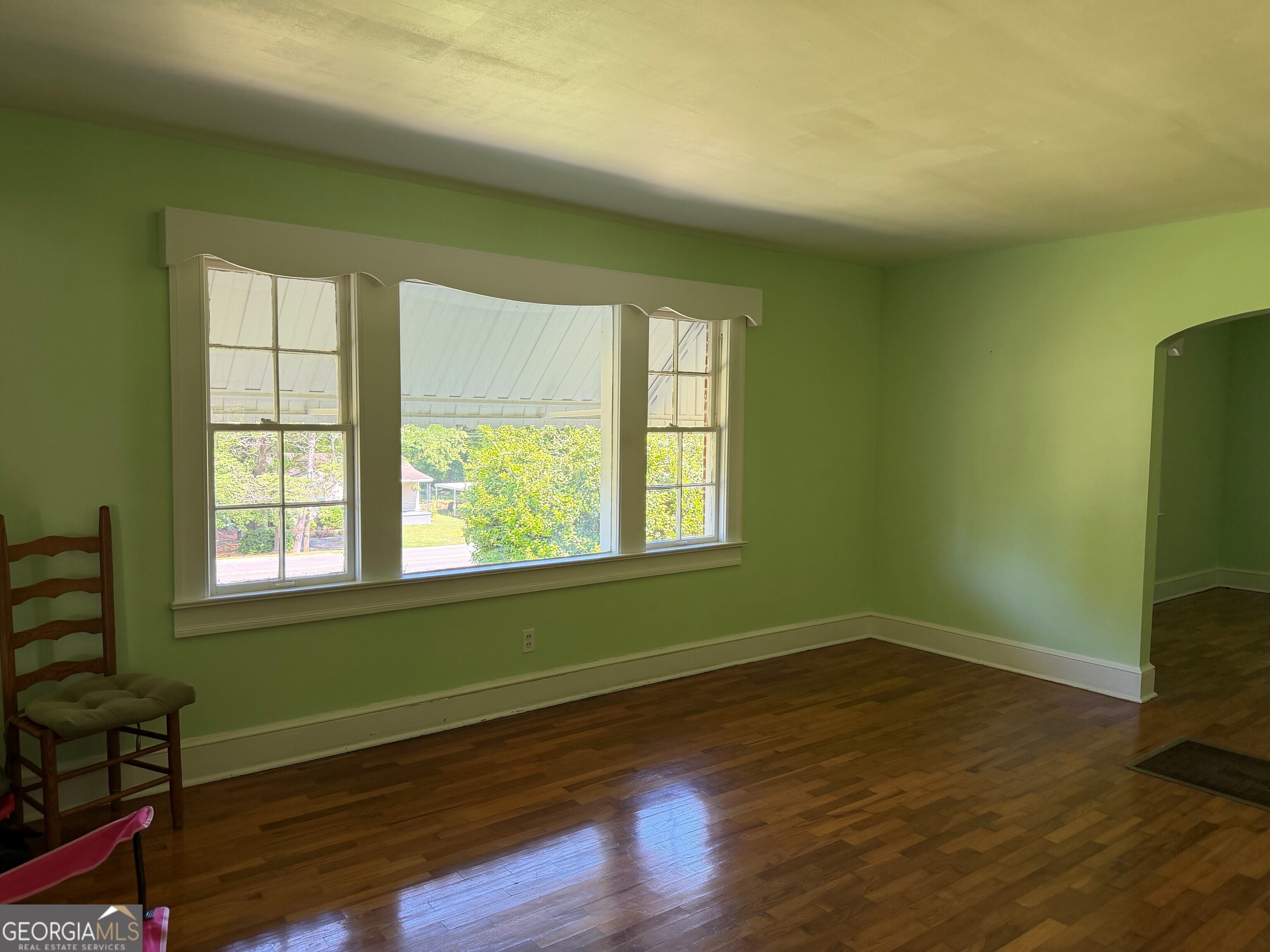 2619 Maple Road Southeast Rome, GA 30161 - Photo 13 of 31 a room with a window and wooden floor