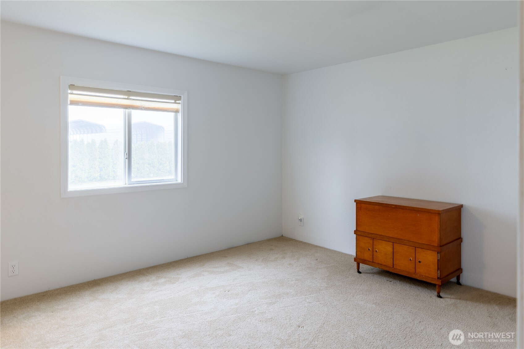 8915 Wilkensen Road Southeast, Unit 9B Yelm, WA 98597 - Photo 21 of 37 an empty room with a window