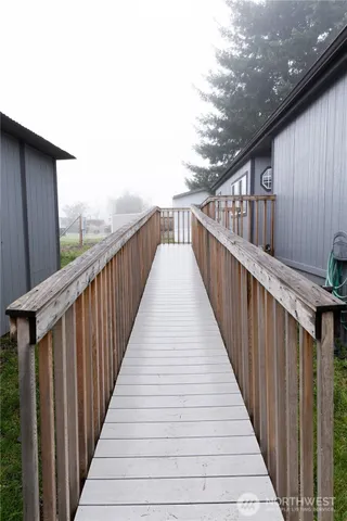 a view of a wooden fence