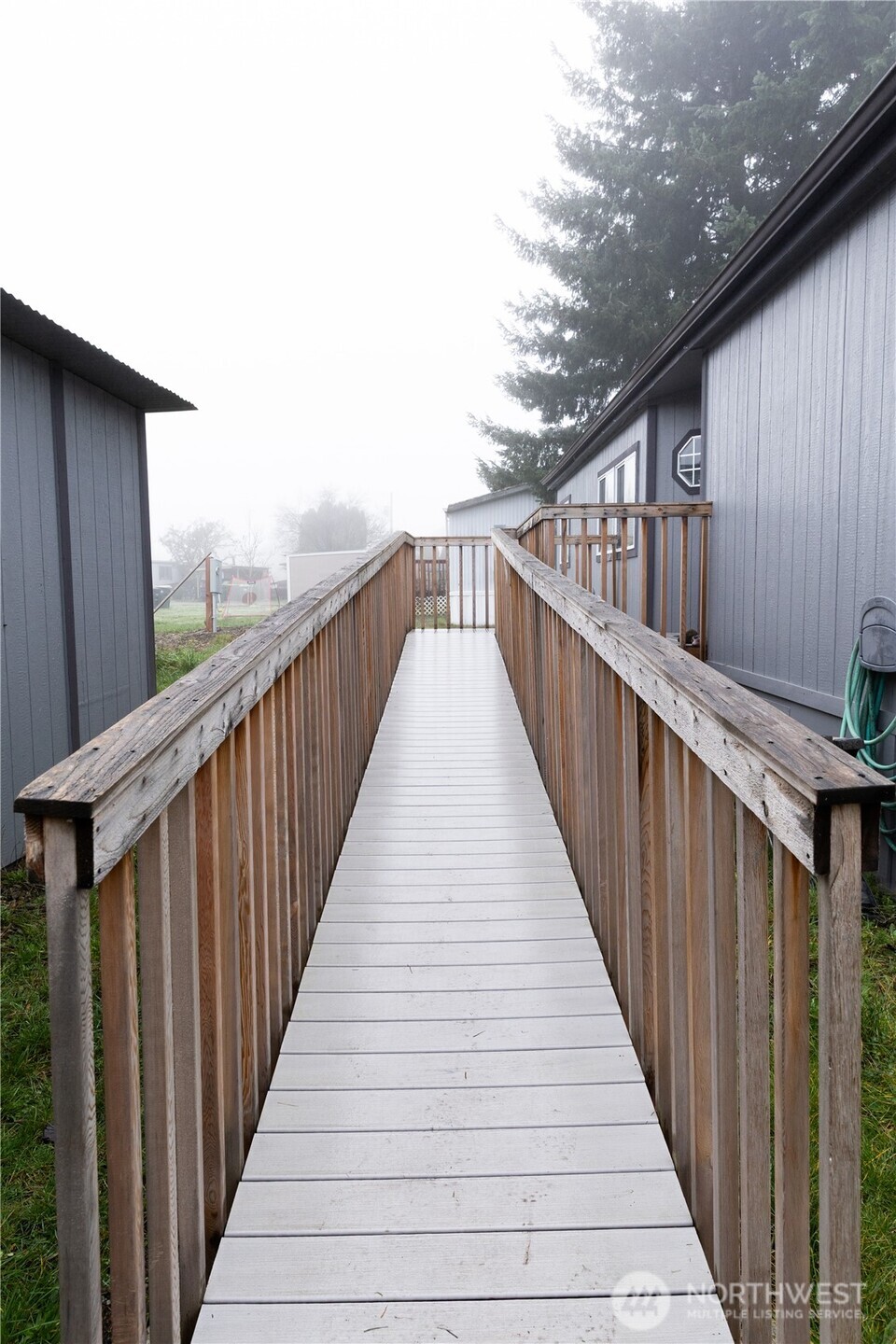 8915 Wilkensen Road Southeast, Unit 9B Yelm, WA 98597 - Photo 31 of 37 a view of balcony with staircase