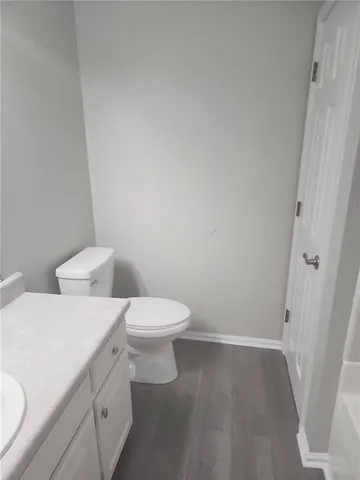 a bathroom with a white bath tub