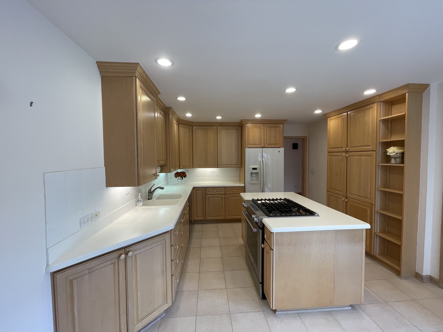 1119 Deerfield Road Deerfield, IL 60015 - Photo 12 of 30 a kitchen with kitchen island sink stove and refrigerator
