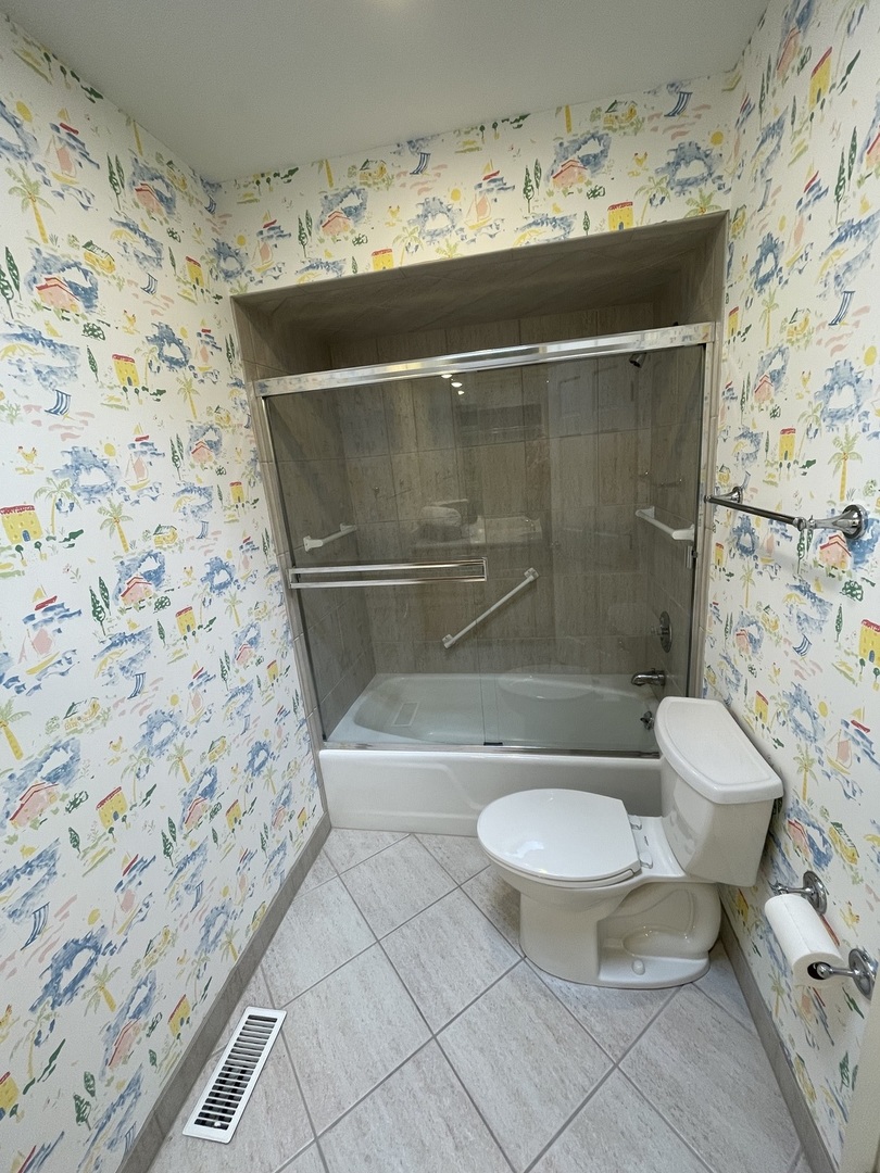 1119 Deerfield Road Deerfield, IL 60015 - Photo 24 of 30 a bathroom with a sink and a mirror