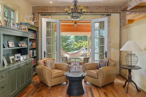 a view of balcony with furniture