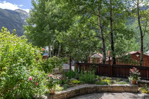 a view of a swimming pool with a yard
