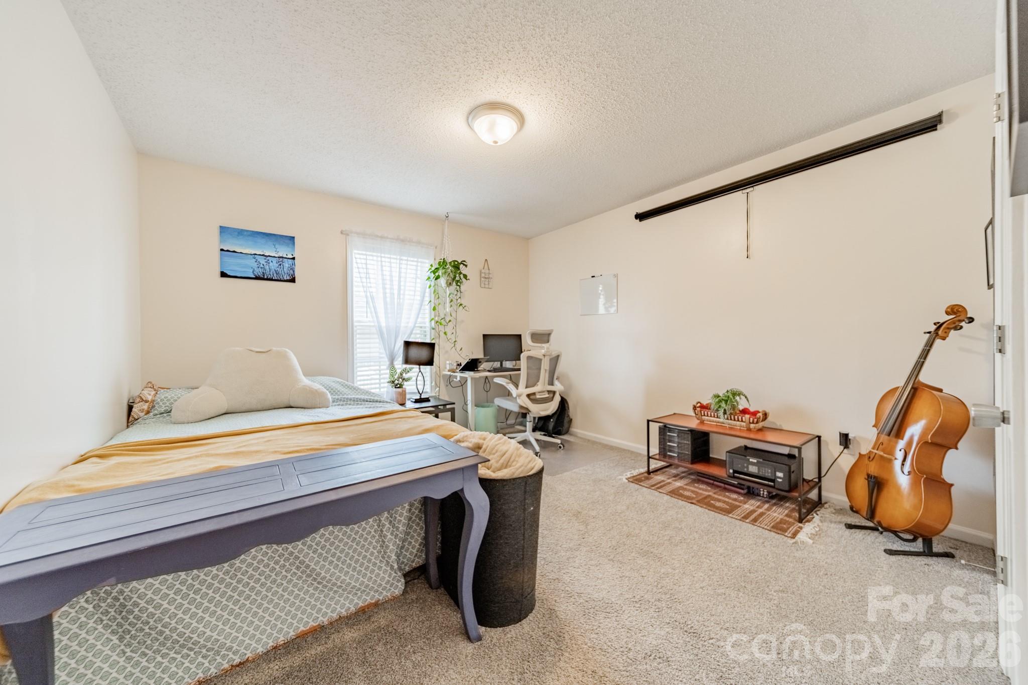 1015 South Walnut Street Kannapolis, NC 28081 - Photo 13 of 19 a room with furniture and air hockey table