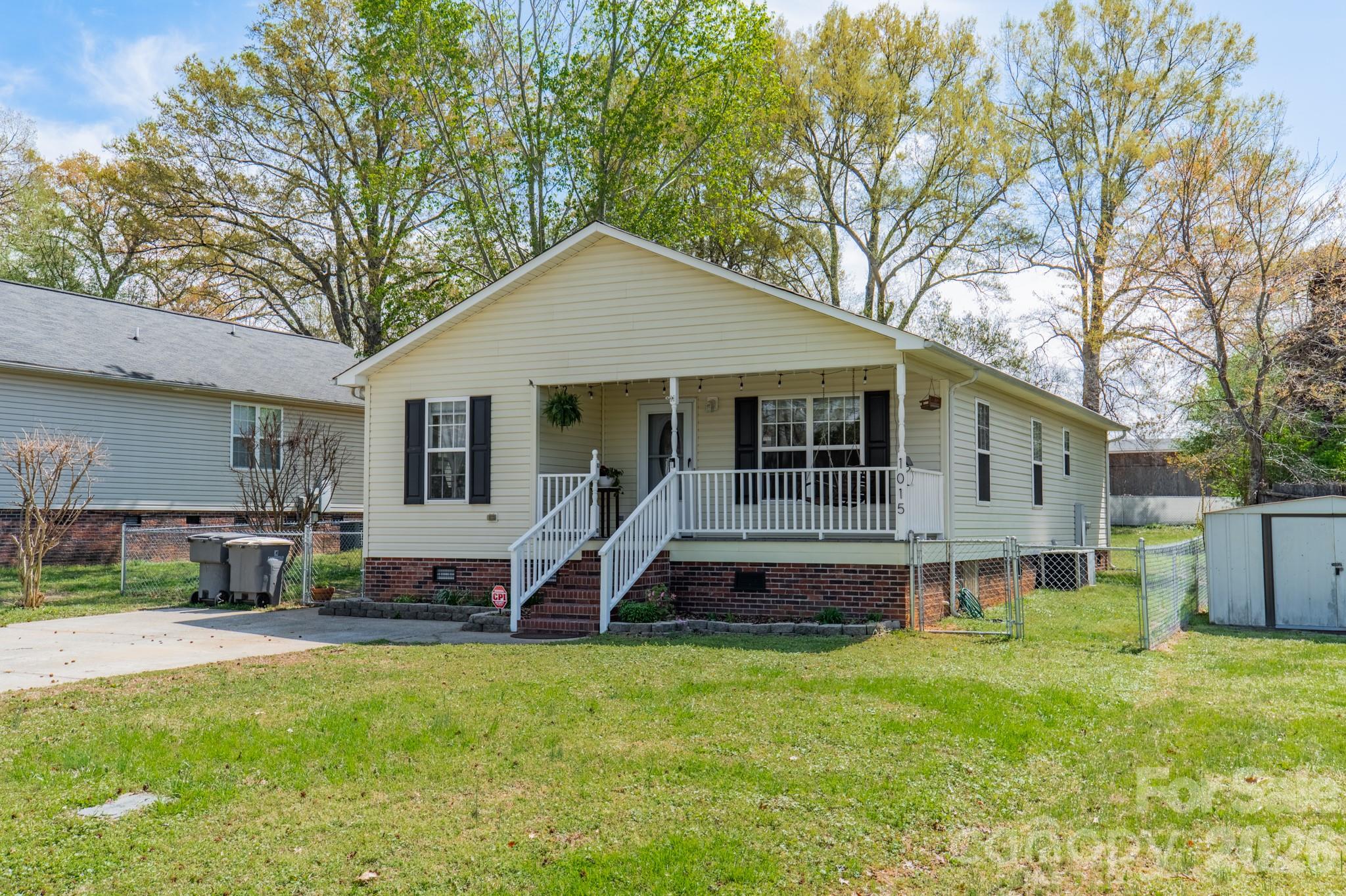 1015 South Walnut Street Kannapolis, NC 28081 - Photo 3 of 19 a front view of house with yard and outdoor seating