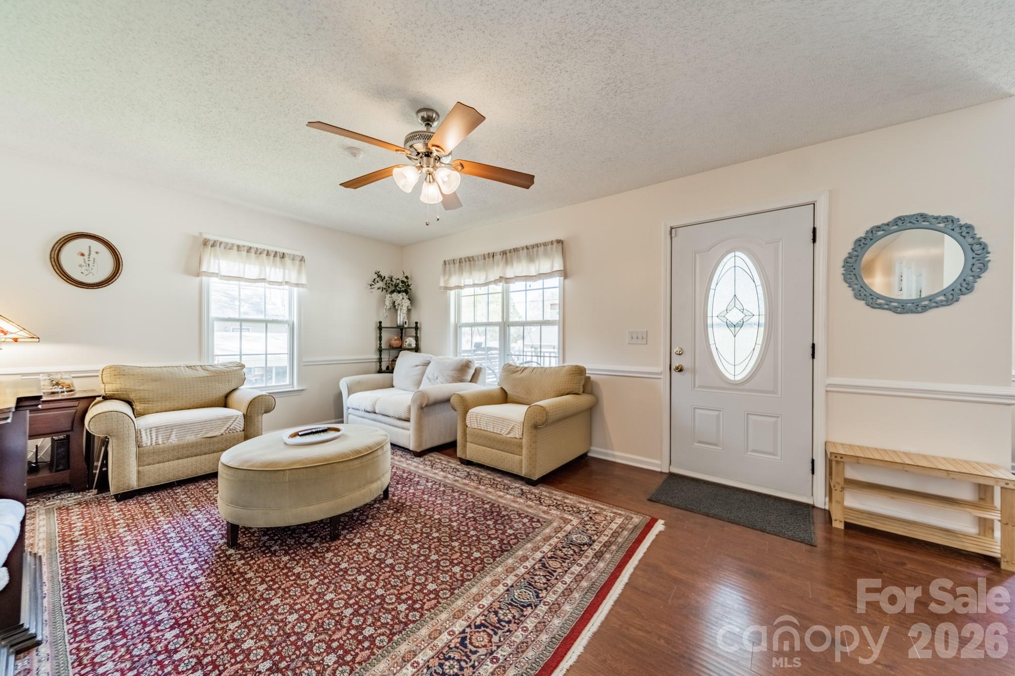1015 South Walnut Street Kannapolis, NC 28081 - Photo 4 of 19 a living room with furniture a rug and a window