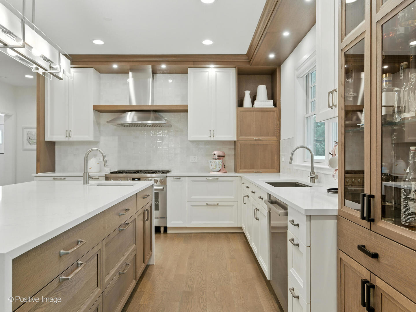 1150 Highland Avenue Lake Forest, IL 60045 - Photo 20 of 63 a kitchen with a sink stove and cabinets