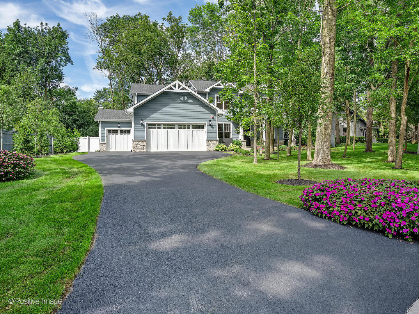 1150 Highland Avenue Lake Forest, IL 60045 - Photo 2 of 63 a front view of a house with garden