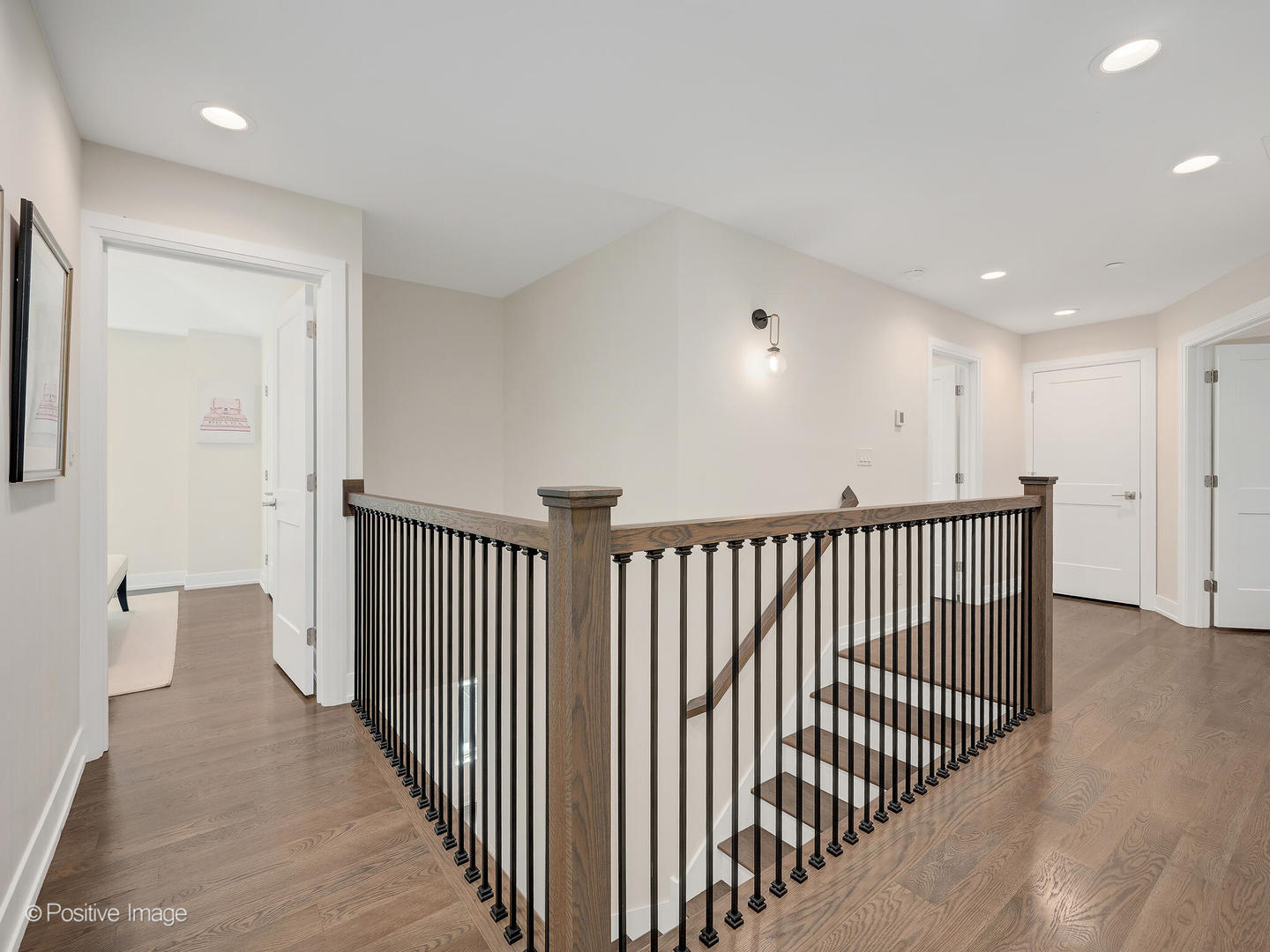 1150 Highland Avenue Lake Forest, IL 60045 - Photo 29 of 63 a view of a hallway with wooden floor and windows