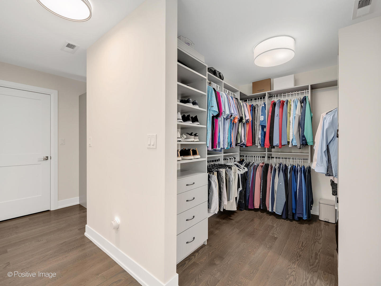 1150 Highland Avenue Lake Forest, IL 60045 - Photo 32 of 63 a view of walk in closet with clothes