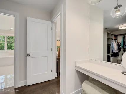 a bathroom with a shower and a sink