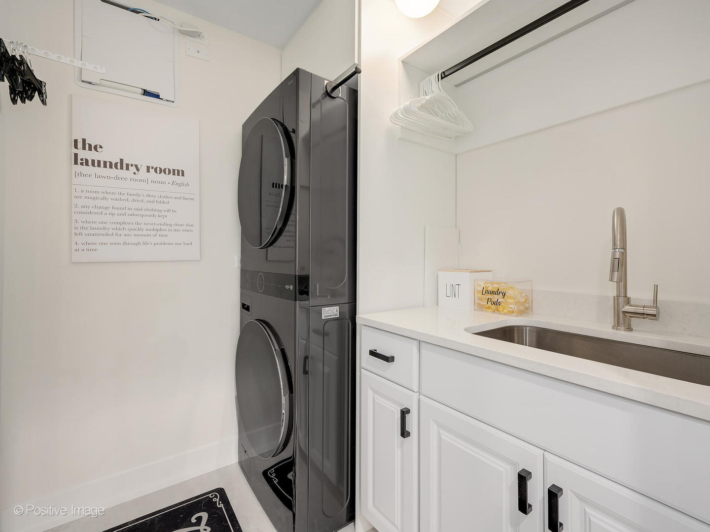 1150 Highland Avenue Lake Forest, IL 60045 - Photo 38 of 63 a utility room with dryer and washer