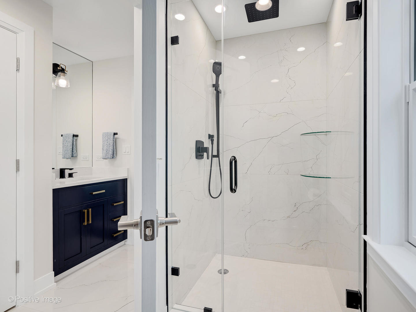 1150 Highland Avenue Lake Forest, IL 60045 - Photo 41 of 63 a bathroom with a shower and a sink