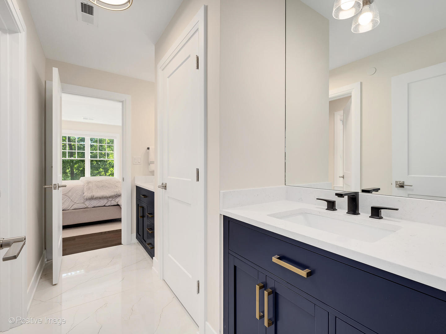 1150 Highland Avenue Lake Forest, IL 60045 - Photo 42 of 63 a bathroom with a sink a vanity and a mirror