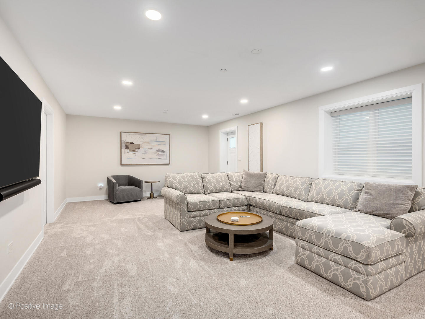 1150 Highland Avenue Lake Forest, IL 60045 - Photo 47 of 63 a living room with furniture and a flat screen tv