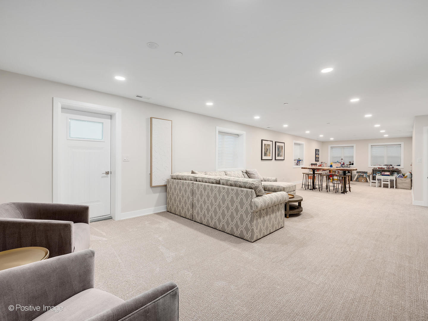 1150 Highland Avenue Lake Forest, IL 60045 - Photo 48 of 63 a living room with furniture and a table