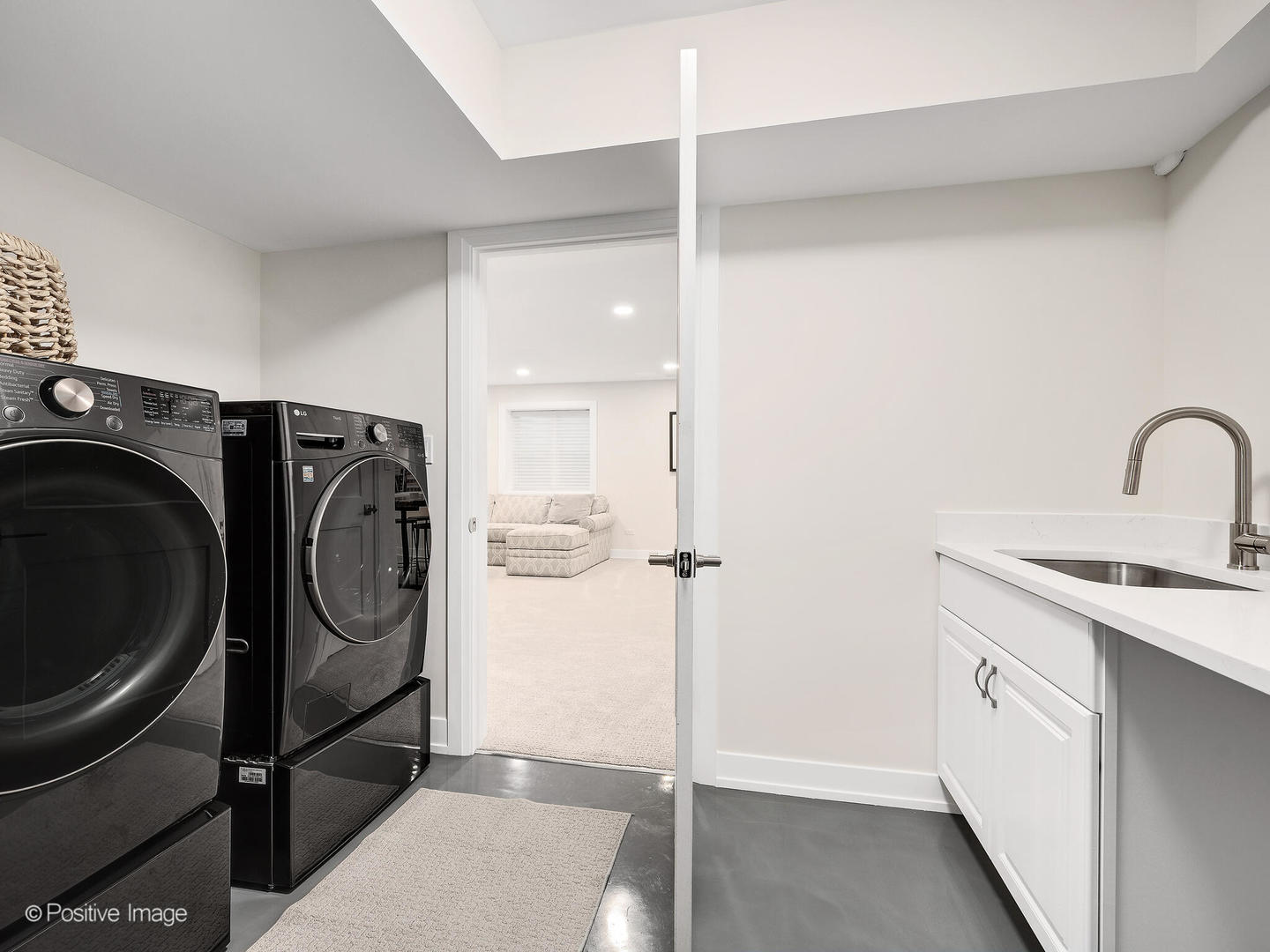 1150 Highland Avenue Lake Forest, IL 60045 - Photo 52 of 63 a utility room with dryer and washer