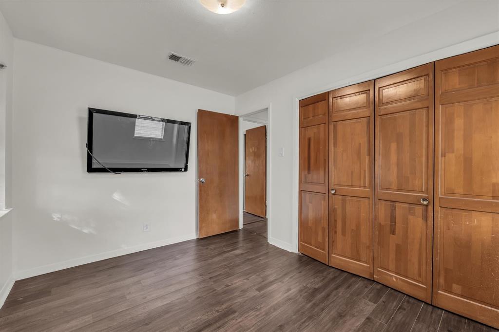 309 South Rita Street Lacy-Lakeview, TX 76705 - Photo 12 of 19 a view of a hallway with wooden floor and cabinet