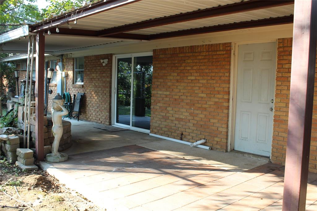309 South Rita Street Lacy-Lakeview, TX 76705 - Photo 17 of 19 Featuring a large covered patio in the backyard