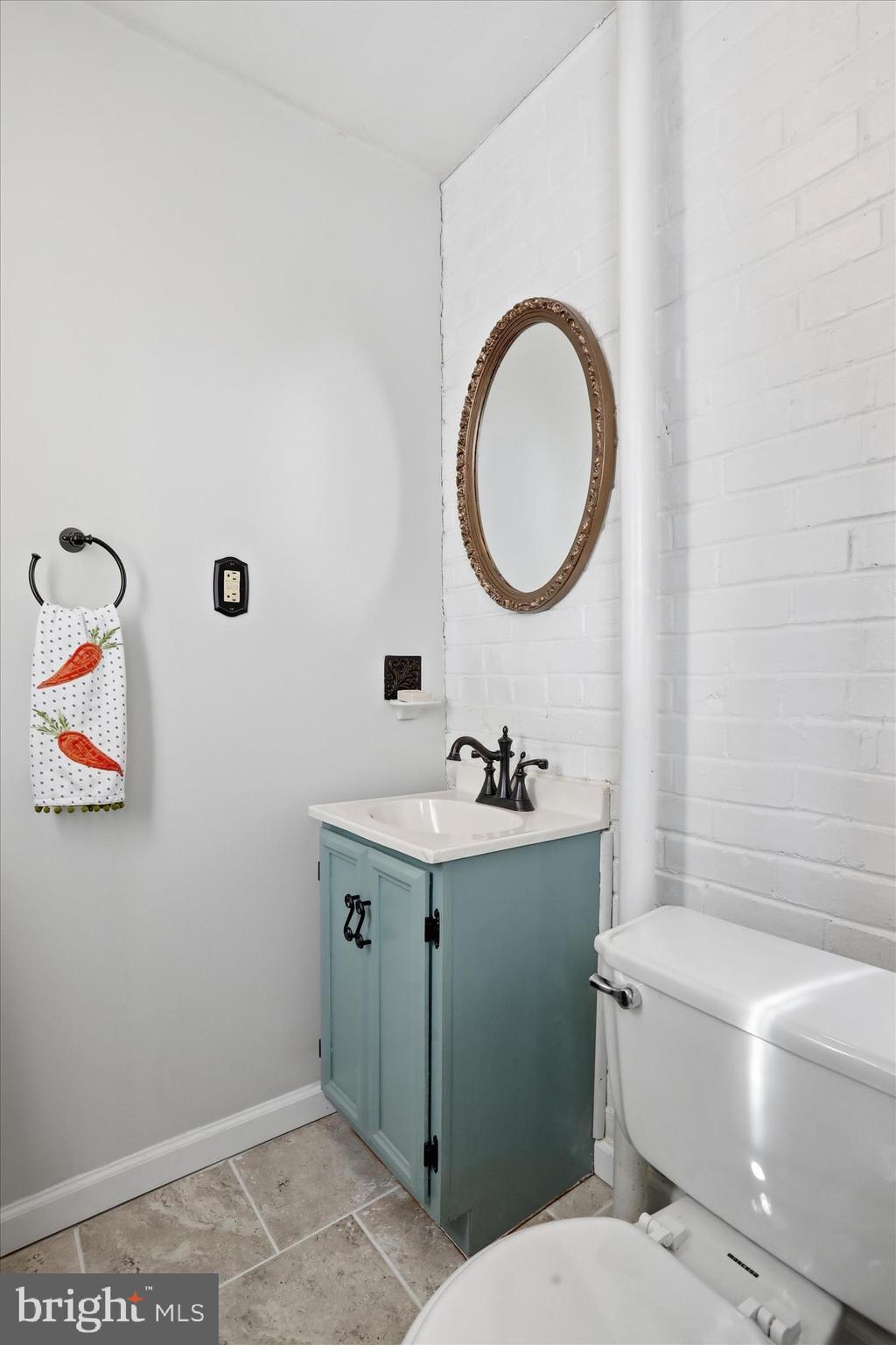 520 Elm Street Frederick, MD 21701 - Photo 12 of 30 1st floor powder room.