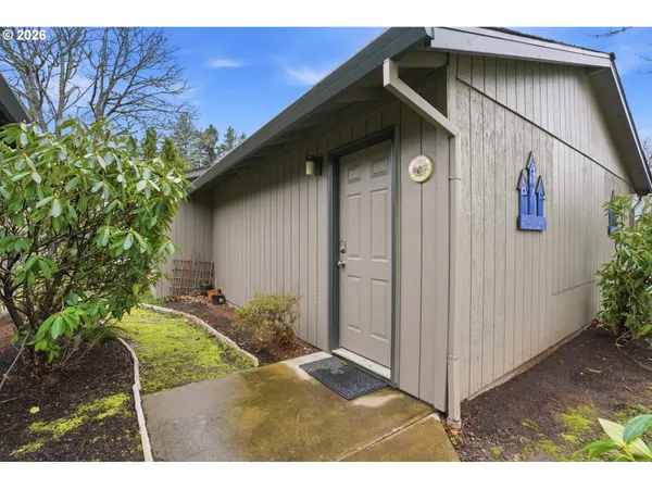a backyard of a house with lots of green space