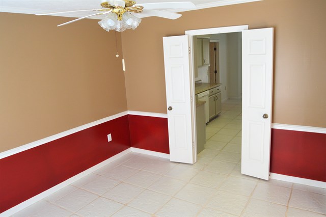 14323 Farmington Road Upatoi, GA 31829 - Photo 5 of 21 Separate dining room with french doors to kitchen