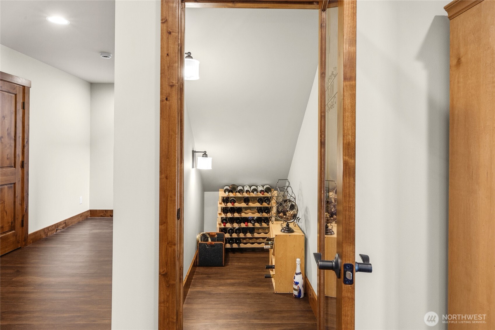 421 Meadow Ridge Drive Cle Elum, WA 98922 - Photo 21 of 39 a view of a hallway with wooden floor and staircase