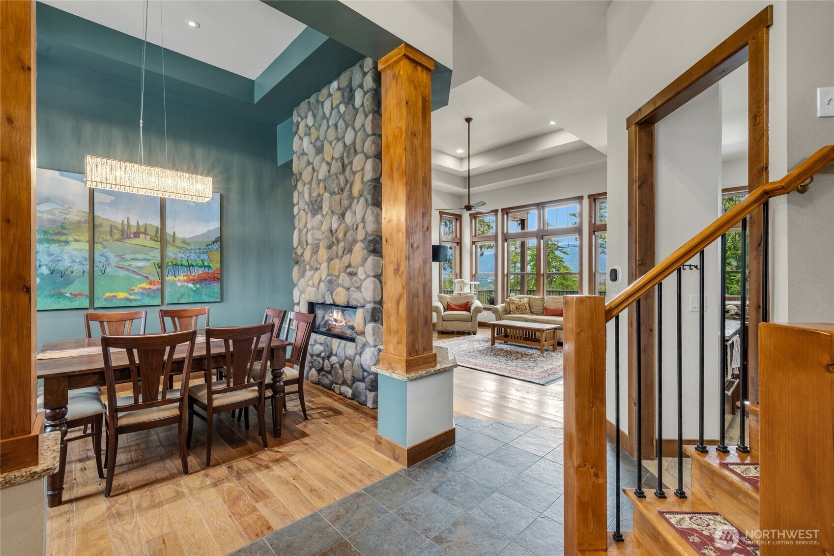 421 Meadow Ridge Drive Cle Elum, WA 98922 - Photo 3 of 39 a view of a dining room with furniture window and wooden floor