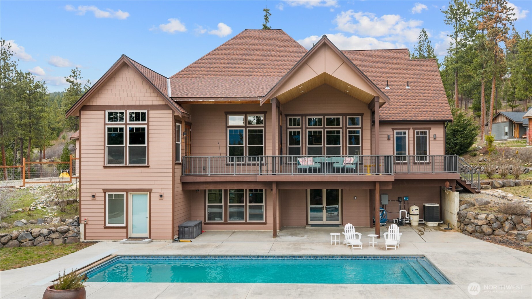 421 Meadow Ridge Drive Cle Elum, WA 98922 - Photo 37 of 39 a front view of house with yard and outdoor seating