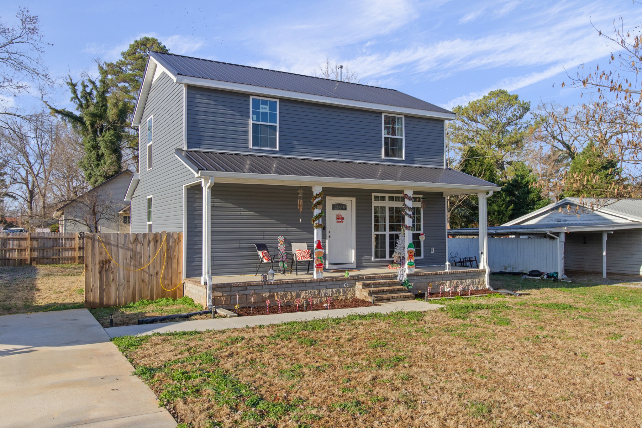 203 5th Avenue North Decherd, TN 37324 - Photo 2 of 27 front view of a house with a yard