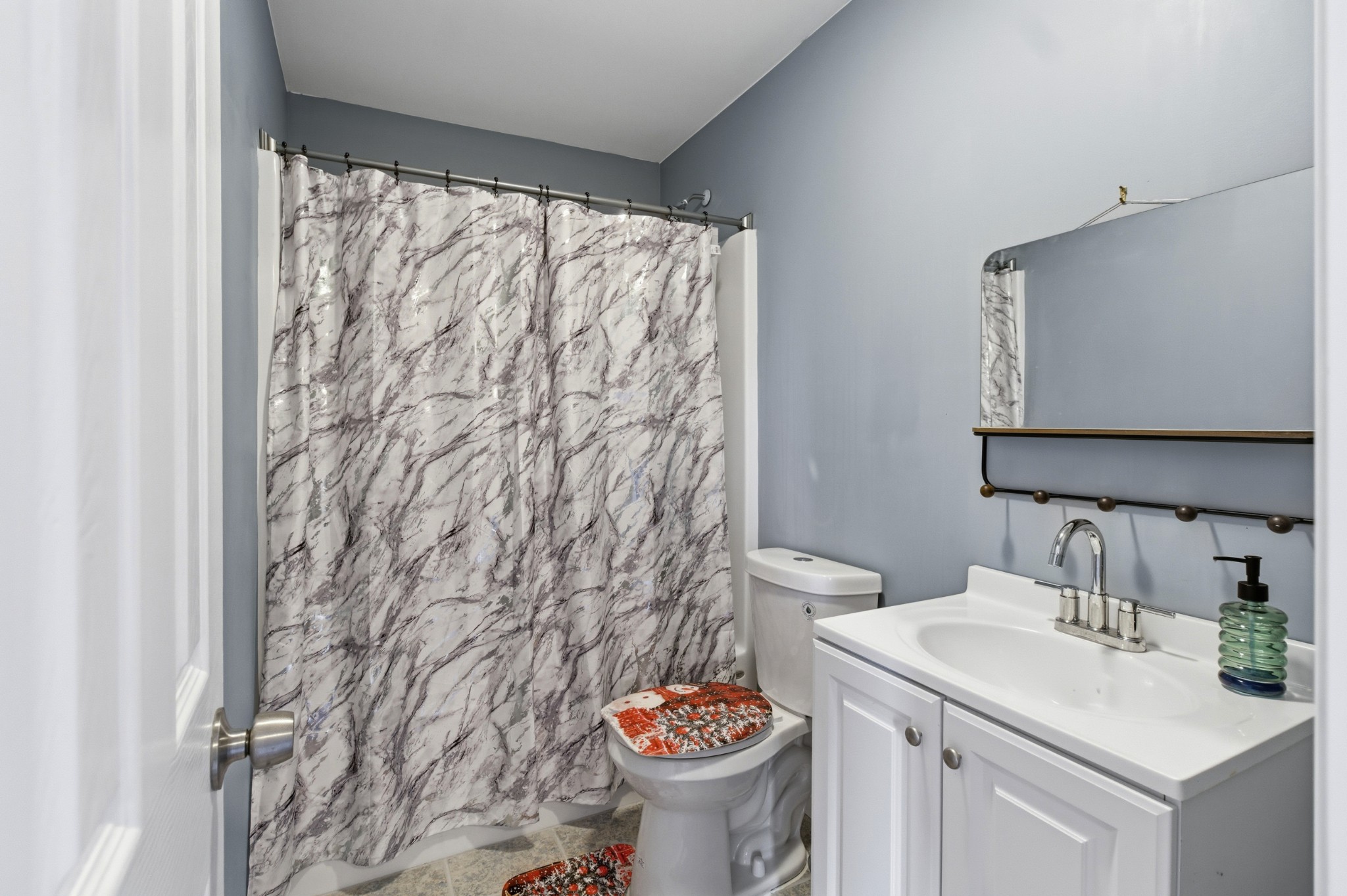 203 5th Avenue North Decherd, TN 37324 - Photo 8 of 27 a bathroom with a sink and a toilet