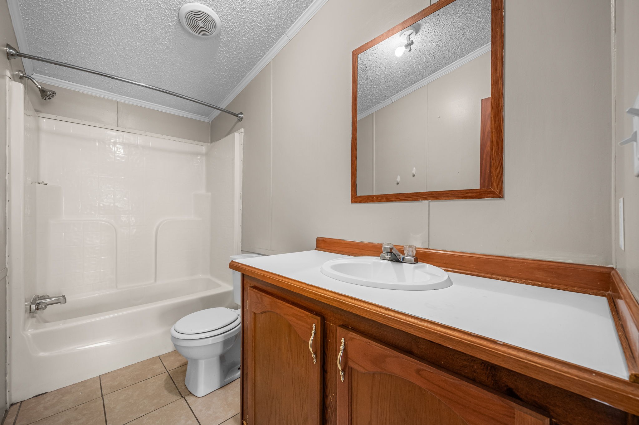 1174 Throneberry Road Normandy, TN 37360 - Photo 22 of 29 a bathroom with a sink a toilet and shower