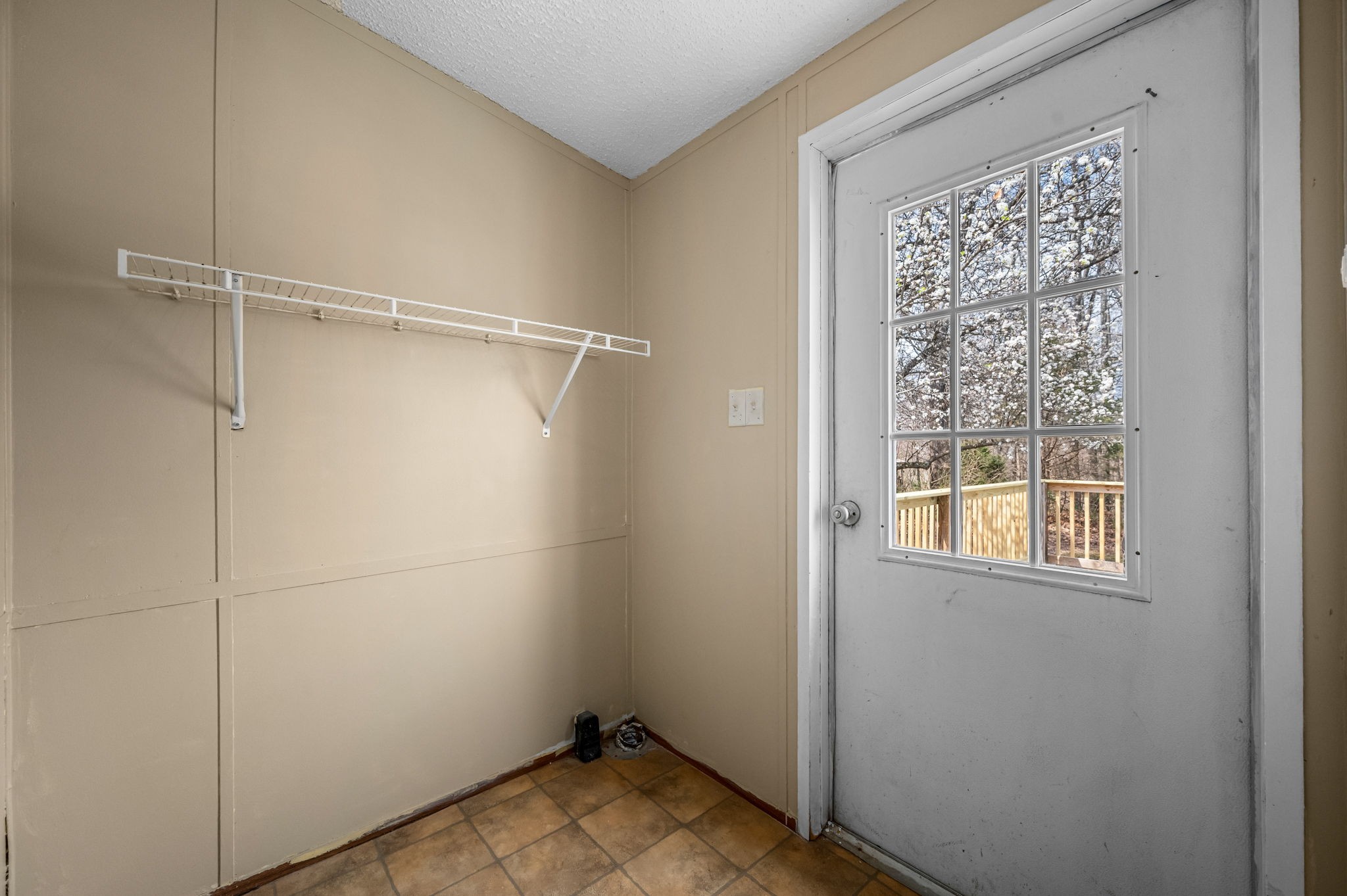 1174 Throneberry Road Normandy, TN 37360 - Photo 23 of 29 a view of a small space with wooden floor and a window