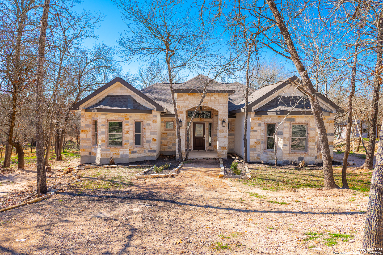 22379 Mathis Road San Antonio, TX 78264 - Photo 1 of 1 a front view of a house with a yard