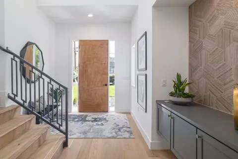 a bedroom with a large bed and a couch