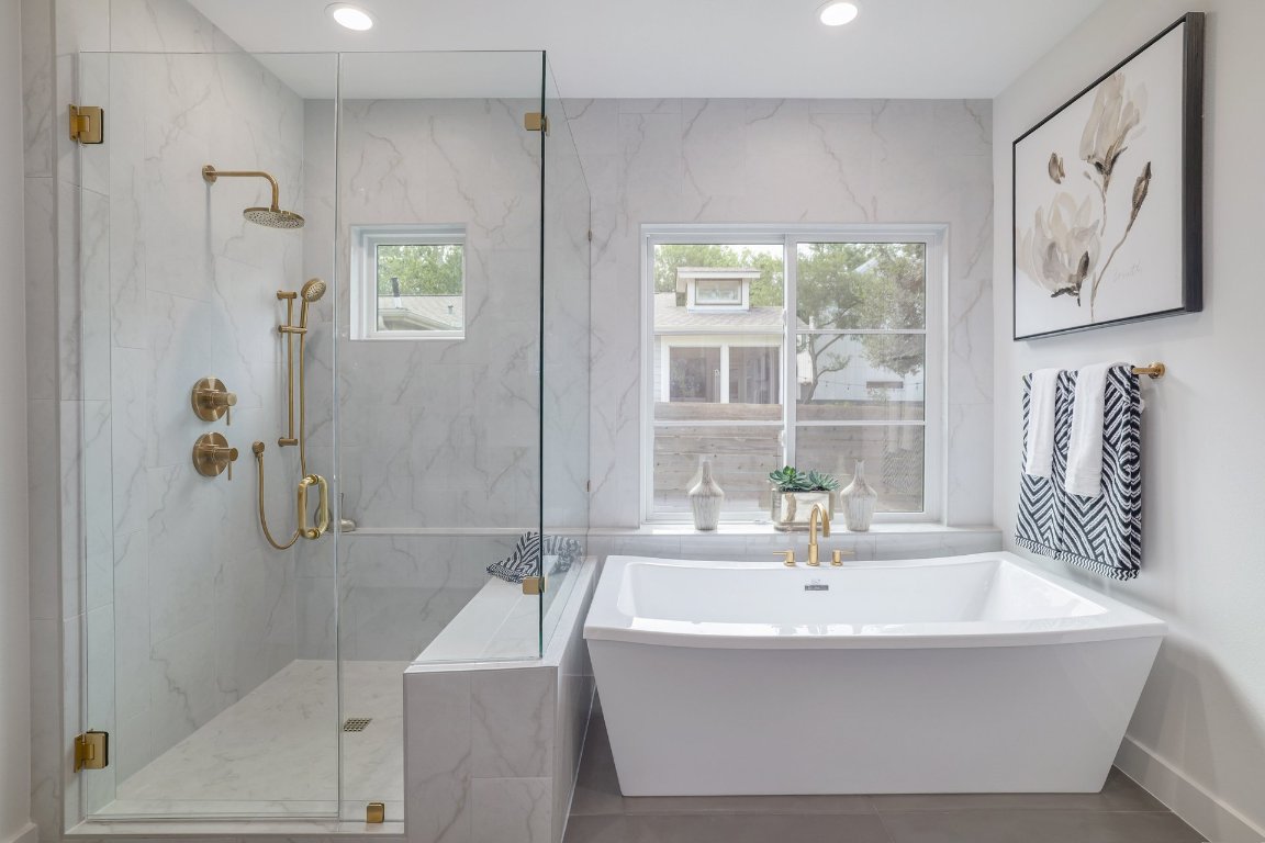 1703 Piedmont Avenue Austin, TX 78757 - Photo 20 of 37 a bath tub sitting next to a bathroom sink