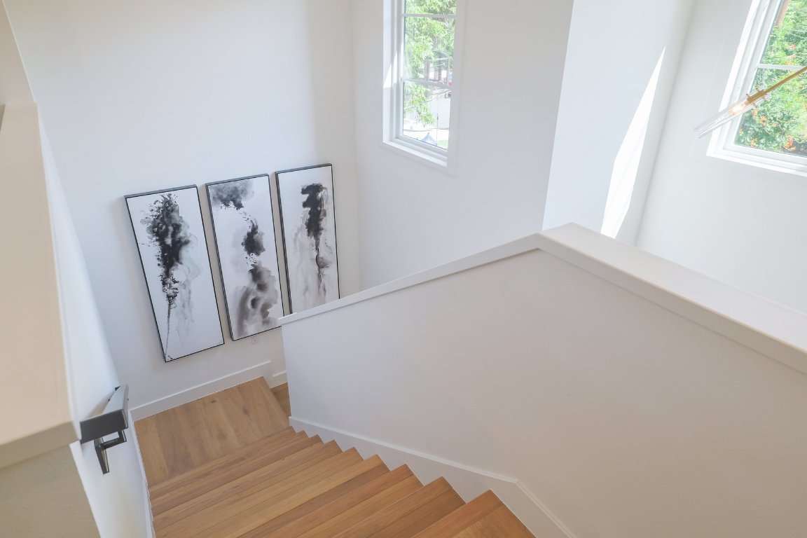 1703 Piedmont Avenue Austin, TX 78757 - Photo 23 of 37 a view of room with window and wooden floor