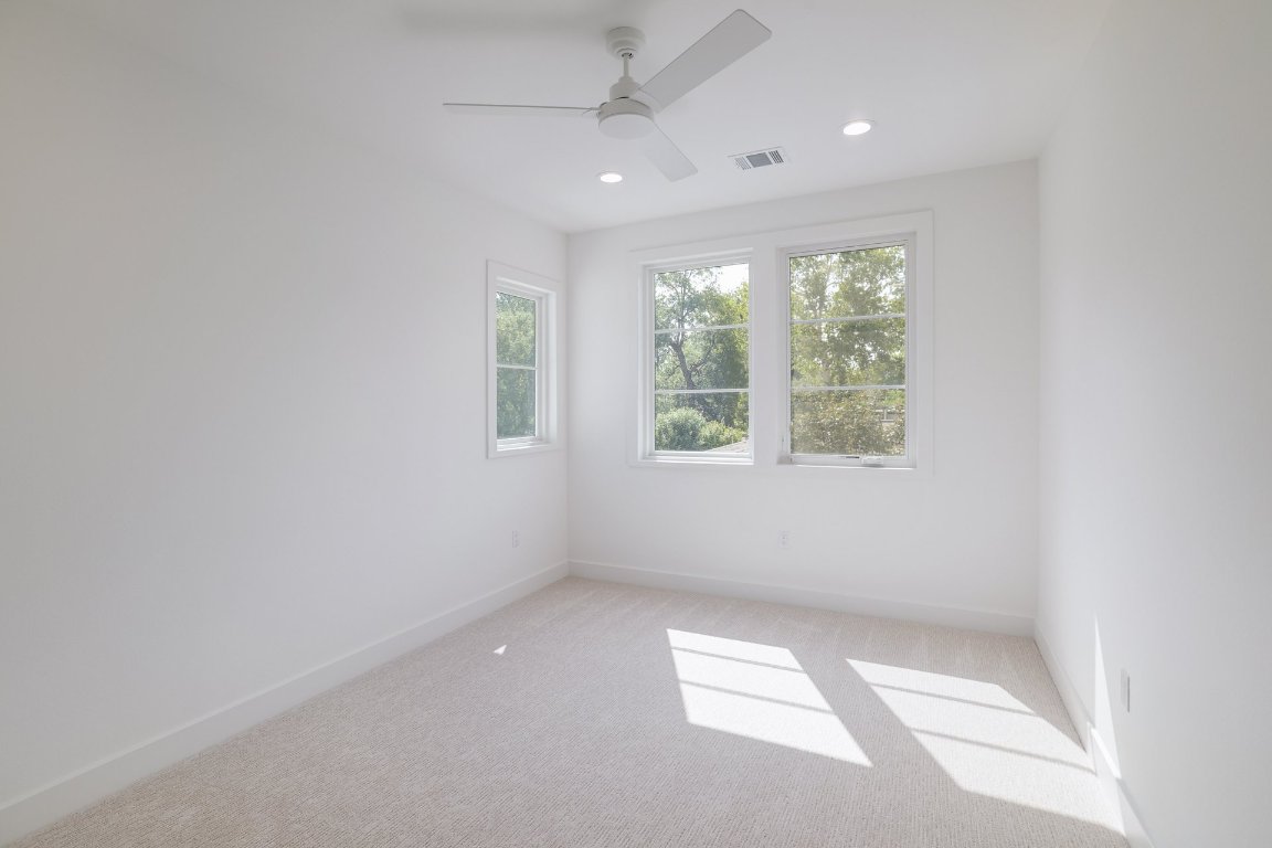 1703 Piedmont Avenue Austin, TX 78757 - Photo 29 of 37 an empty room with windows