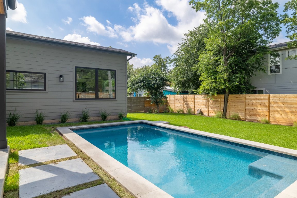 1703 Piedmont Avenue Austin, TX 78757 - Photo 34 of 37 a view of swimming pool with a yard