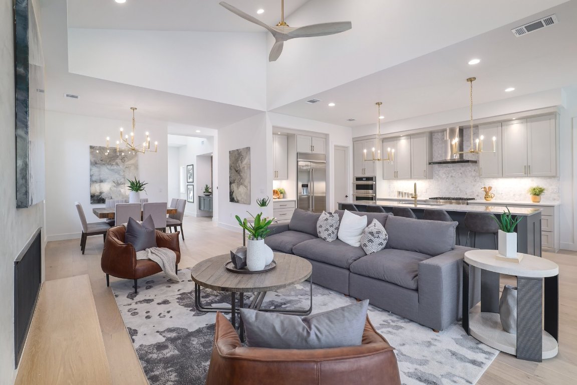 1703 Piedmont Avenue Austin, TX 78757 - Photo 5 of 37 a living room with furniture and kitchen view