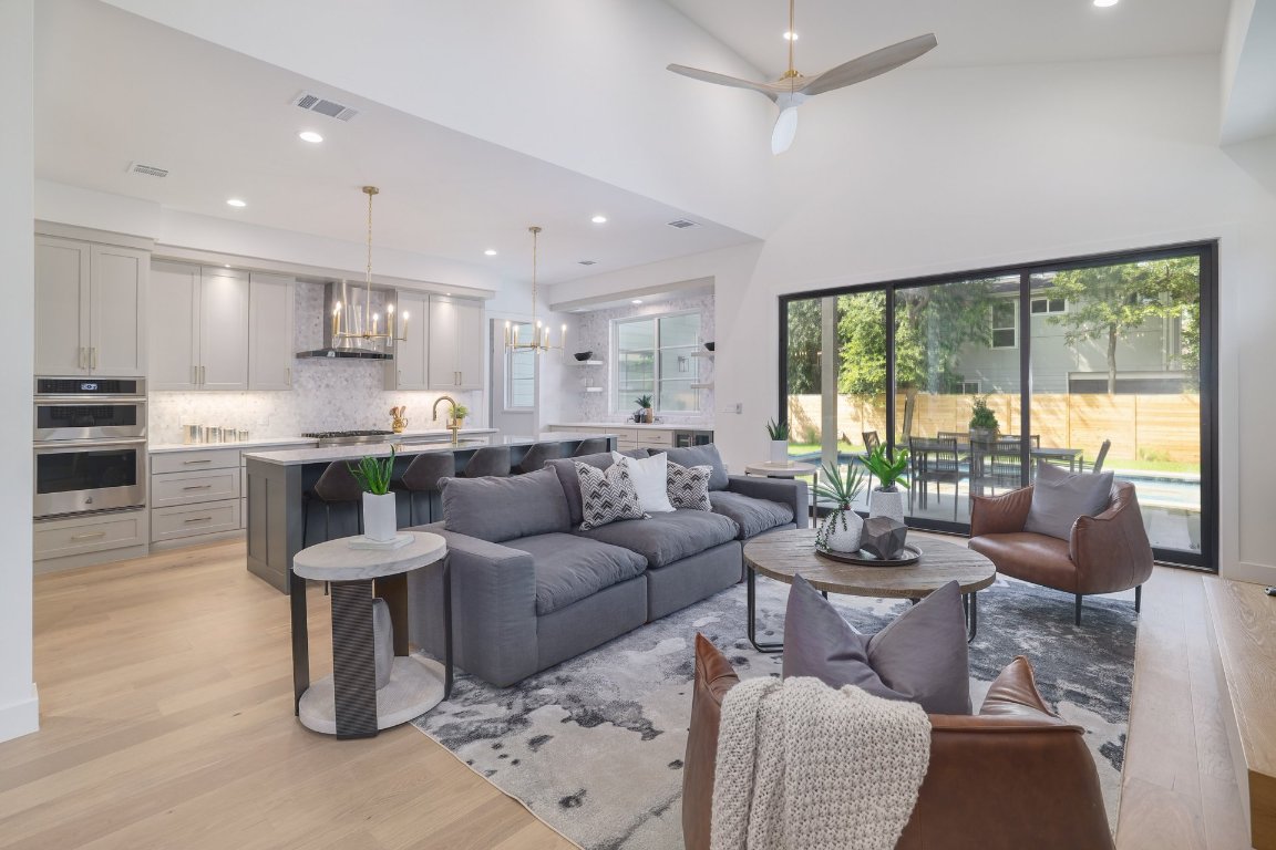 1703 Piedmont Avenue Austin, TX 78757 - Photo 10 of 37 a living room with furniture and a large window