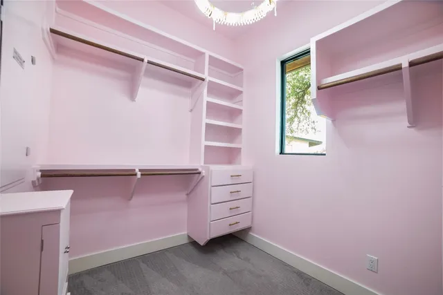 a view of an empty walk in closet