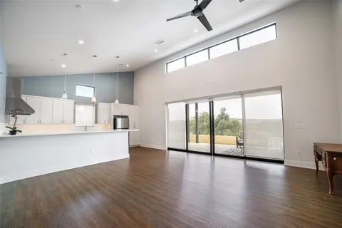 a view of kitchen with cabinets and wooden floor