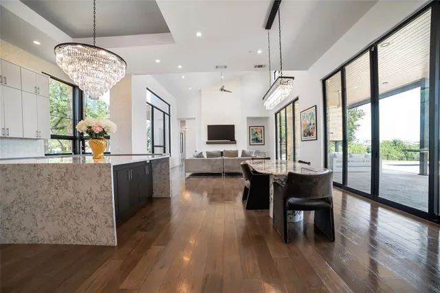 a view of a dining room with furniture window and wooden floor