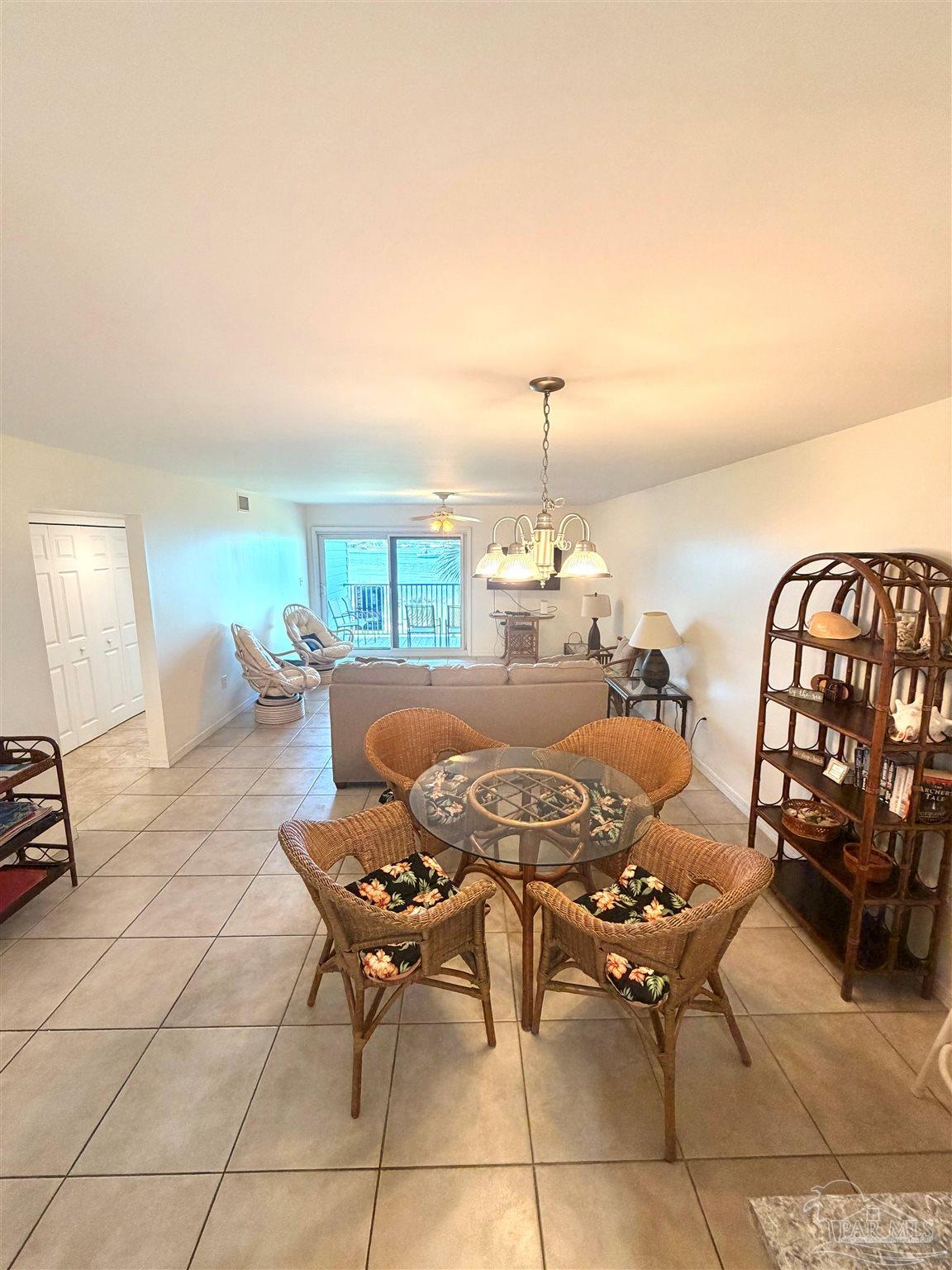 16470 Perdido Key Drive, Unit B13 Perdido Key, FL 32507 - Photo 11 of 17 a living room with furniture and a window